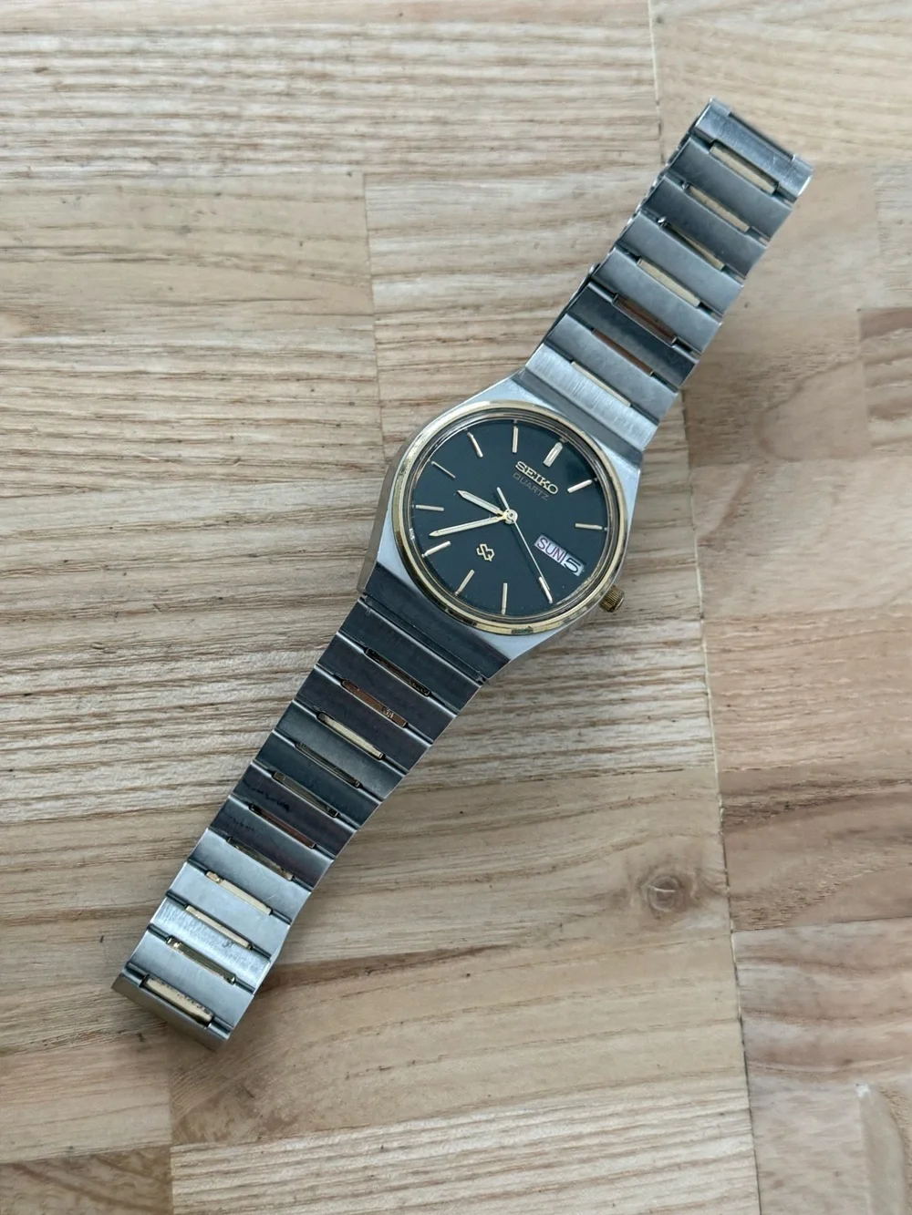 Seiko SQ Vintage Watch Gold Plated Bezel and Bracelet Black Dial Date Window